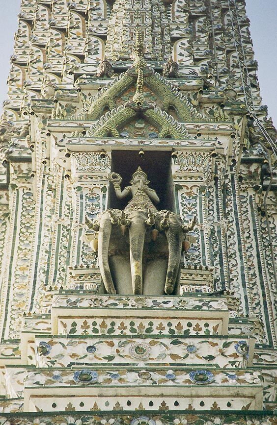 Phra Prang, the central tower of the Wat Arun ("Temple of Dawn") in Bangkok, Thailand, showing Indra on his three-headed elephant Erawan (Airavata)